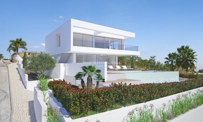 House nueva under construction V3 Luz Lagos - alarm, boiler, swimming pool, barbecue, garden, garage, air conditioning, terrace, double glazing