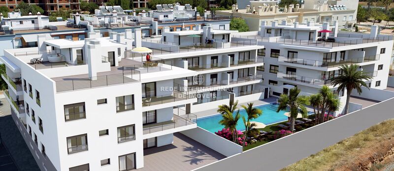 Apartment T3 neue Tavira - radiant floor, air conditioning, solar panels, swimming pool, kitchen, sea view