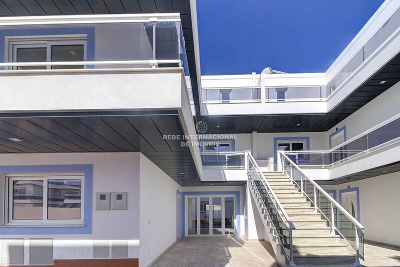 Apartamento T1 Moderno Vila Nova de Cacela Vila Real de Santo António - condomínio privado, zonas verdes, parqueamento, cozinha equipada, piscina, painéis solares, garagem, ar condicionado