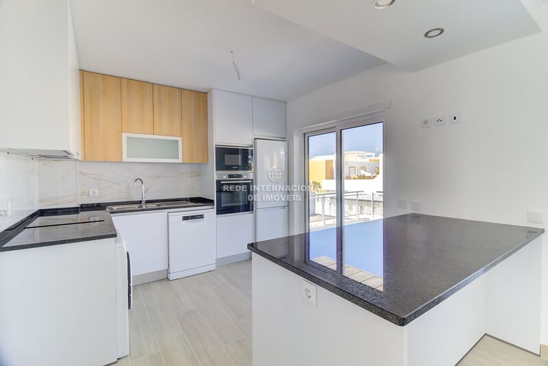 Apartamento novo T1 Vila Nova de Cacela Vila Real de Santo António - painéis solares, condomínio privado, bbq, garagem, terraço, piscina, ar condicionado, zonas verdes