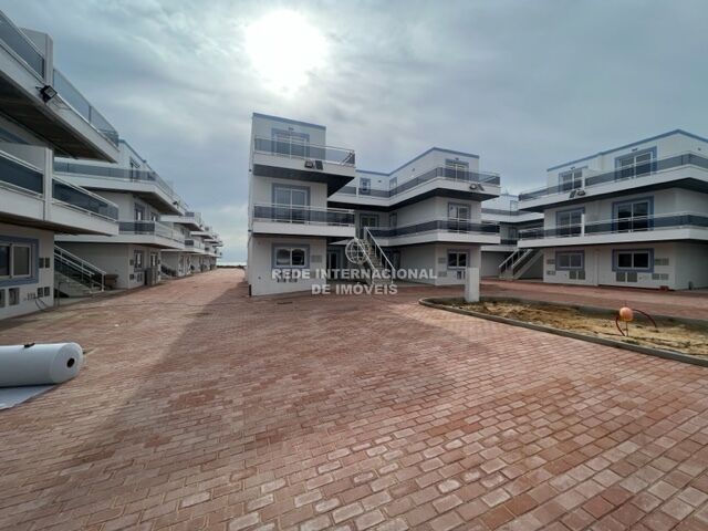 Apartamento novo T1 Vila Nova de Cacela Vila Real de Santo António - zonas verdes, ar condicionado, terraço, condomínio privado, garagem, piscina, bbq, painéis solares