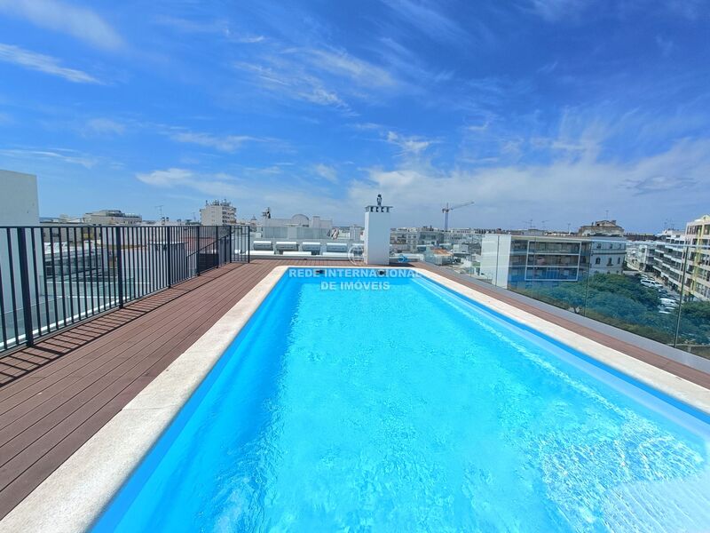 Apartamento T2 Moderno bem localizado Baixa Olhão - vidros duplos, painel solar, ar condicionado, piscina, varanda