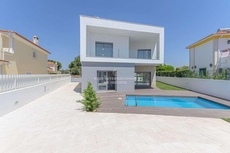 House new 4 bedrooms Setúbal - central heating, alarm, fireplace, garage, solar panel, store room, garden, terrace, swimming pool, air conditioning, balcony, barbecue