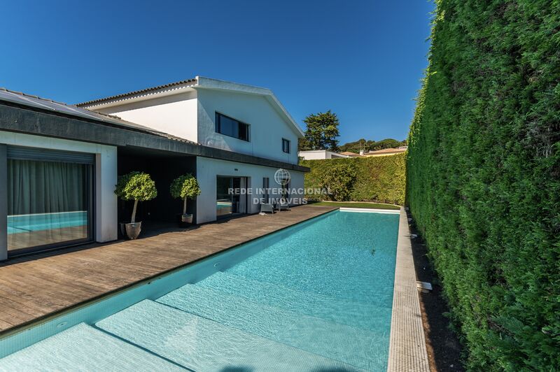 House 4+2 bedrooms Modern Cascais - equipped kitchen, store room, air conditioning, garage, double glazing, alarm, garden, central heating, swimming pool, boiler, fireplace