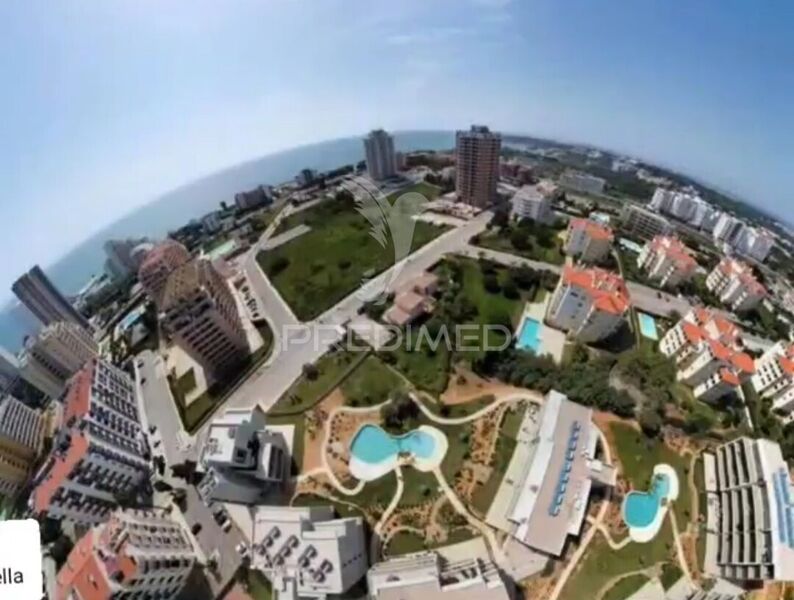 Apartamento T2 novo Portimão - parque infantil, sauna, ar condicionado, painéis solares, terraço, piscina, jardim