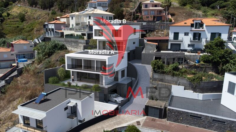 Venda de Moradia V3 Geminada Água de Pena Machico - varanda, garagem