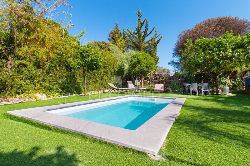 Moradia V4 Térrea Castelo (Sesimbra) - garagem, vista mar, lareira, piscina, bbq, jardim