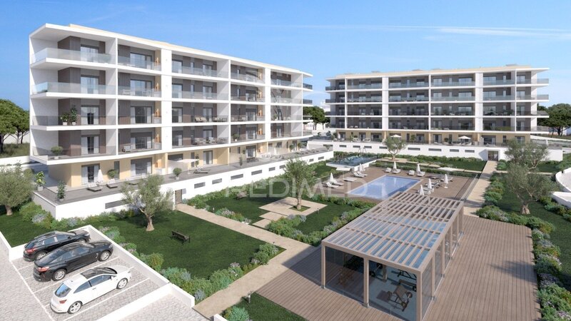 Apartment 3 bedrooms new Portimão - playground, thermal insulation, gated community, central heating, video surveillance, barbecue, garage, air conditioning, radiant floor, swimming pool, garden, balcony