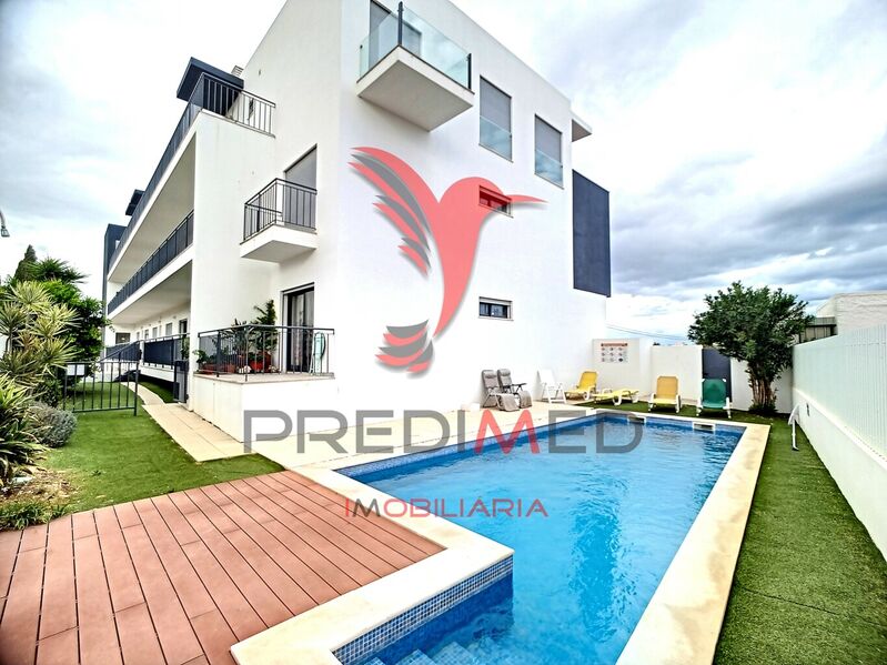 Apartamento perto da praia T2 Cabanas de Tavira - piscina, ar condicionado, condomínio privado, equipado, cozinha equipada, garagem, jardim, mobilado, painéis solares, varanda, vidros duplos