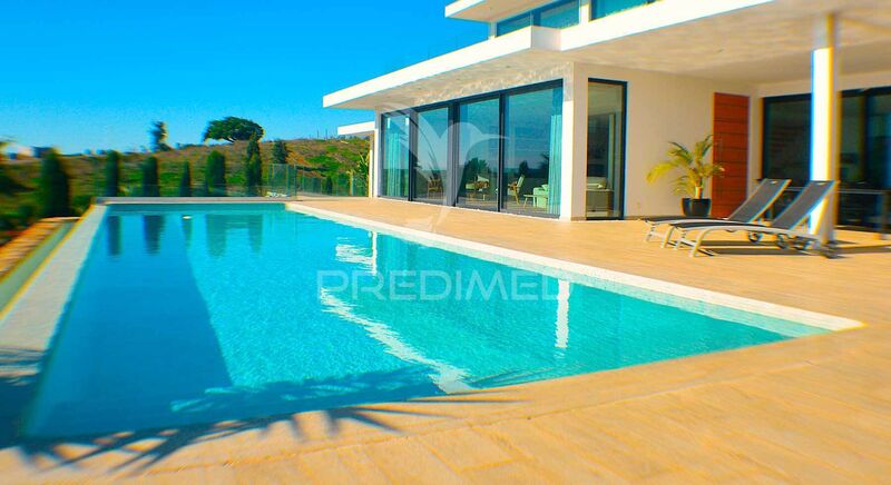 House V5 Luxury Vila Nova de Cacela Vila Real de Santo António - balcony, air conditioning, solar panels, sea view, fireplace, garage, store room, garden, swimming pool