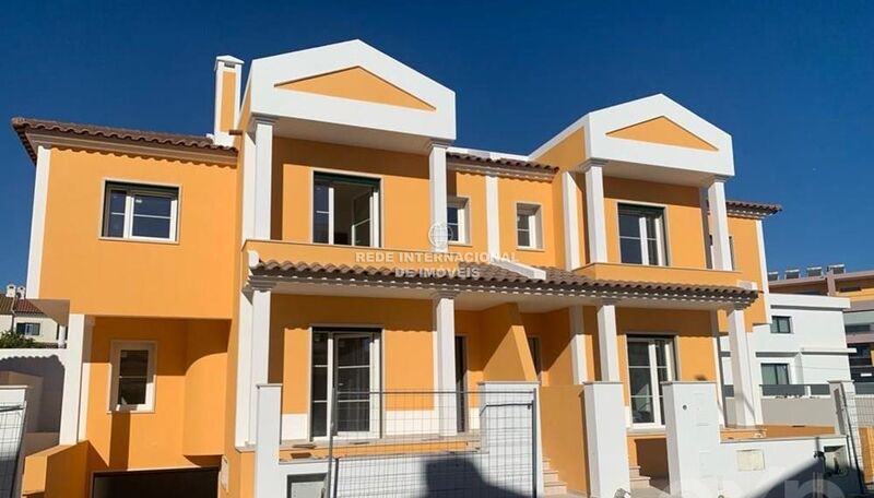 House Semidetached under construction V4 Seixal - air conditioning, balcony, garage, swimming pool, alarm, garden, playground, equipped kitchen, fireplace