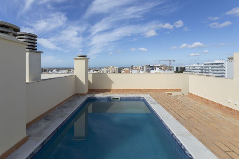 Apartamento T4+1 Duplex no centro Hospital de Faro - lareira, terraços, garagem, vidros duplos, vista magnífica, varandas, piscina