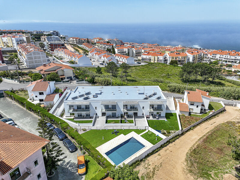 Apartment T2 in the center Ericeira Mafra - air conditioning, solar panels, swimming pool, garden, gated community, kitchen, sea view, store room, parking lot, balcony