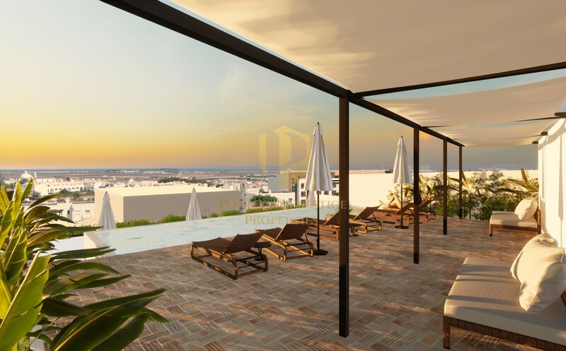 Apartamento no centro T3 Tavira - piso radiante, jardim, piscina, terraço, garagem, cozinha equipada, sauna, painéis solares