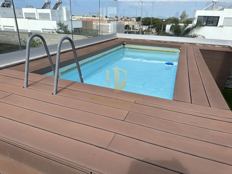 Moradia V3+1 de luxo Pechão Olhão - arrecadação, terraço, vidros duplos, garagem, vista mar, painéis solares, alarme, bbq, ar condicionado, piscina