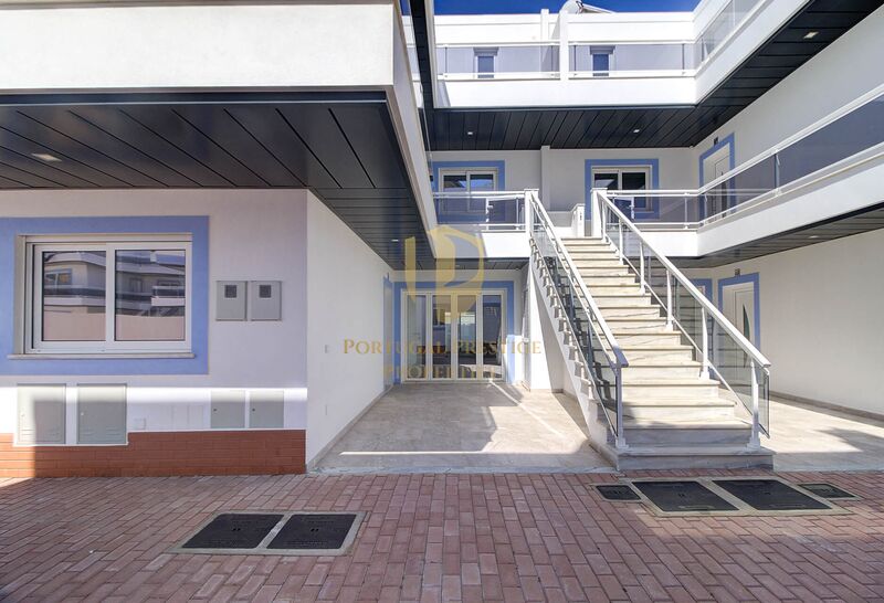 Apartamento T1 Moderno Vila Nova de Cacela Vila Real de Santo António - zonas verdes, piscina, garagem, cozinha equipada, parqueamento, ar condicionado, painéis solares, condomínio privado