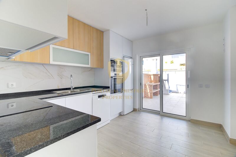 Apartment T1 Modern Vila Nova de Cacela Vila Real de Santo António - swimming pool, green areas, garage, parking lot, kitchen, solar panels, air conditioning, condominium