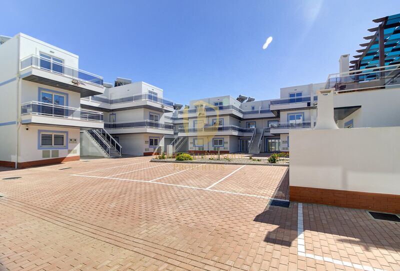 Apartamento T0 Moderno Vila Nova de Cacela Vila Real de Santo António - condomínio privado, painéis solares, ar condicionado, zonas verdes, piscina, garagem