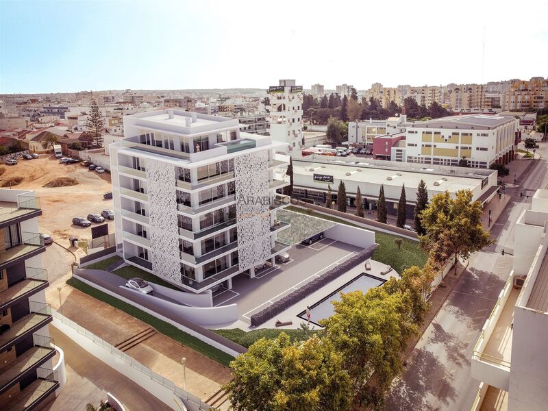 Apartamento T3 novo em construção Portimão - Centro - arrecadação, bbq, painel solar, jardim, varanda, piscina, condomínio privado