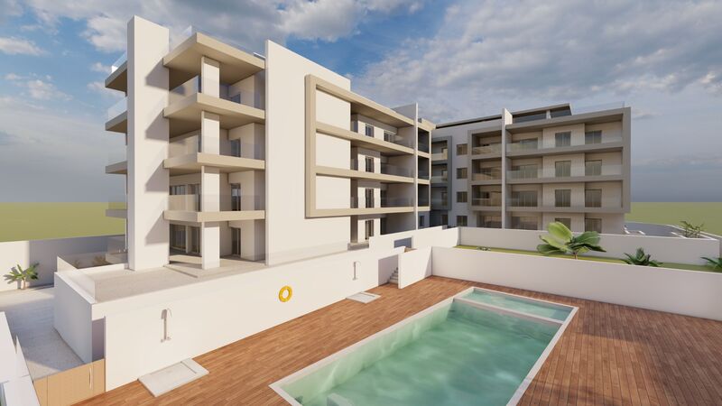 Apartamento de luxo T2 Olhos de Água Albufeira - ar condicionado, piscina, garagem, vidros duplos, jardim, equipado