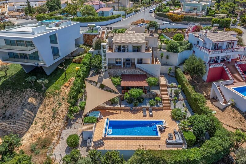 жилой дом V3 элитная Carvoeiro Lagoa (Algarve) - терраса, террасы, система кондиционирования, барбекю, сигнализация, сады, сад, полы с подогревом, камин, двойные стекла, бассейн