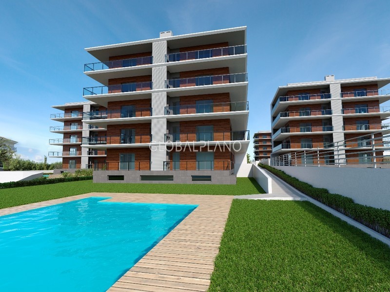 Apartment T2 Luxury Praia da Rocha Portimão - air conditioning, garden, swimming pool, garage, gated community, underfloor heating, parking space