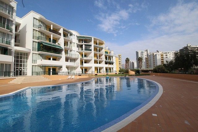 апартаменты T2 Praia da Rocha Portimão - веранды, сады, бассейн, веранда, гараж