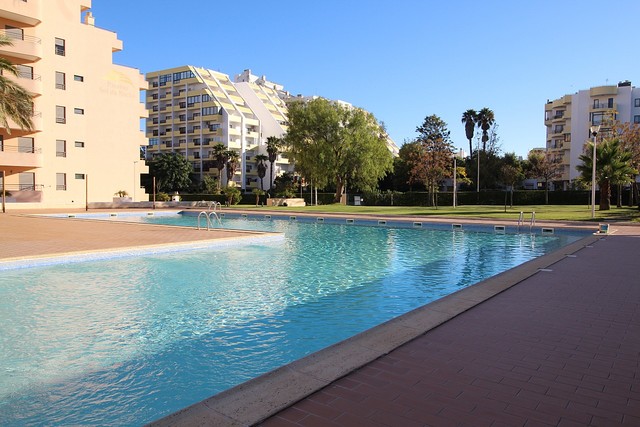 Apartment Modern T1 Praia da Rocha Portimão - garage, balcony, swimming pool, parking space, tennis court, air conditioning