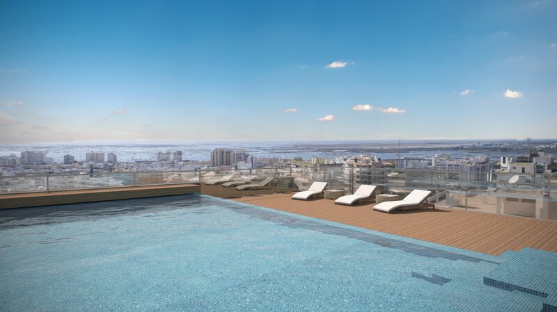 Apartamento T2 de luxo no centro Faro para vender - piscina, varandas, isolamento acústico, isolamento térmico, arrecadação, terraços, ar condicionado, jardim