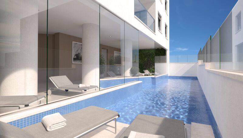 Apartamento T1 Moderno com boas áreas Praia da Rocha Portimão - ar condicionado, piscina, painel solar, chão radiante, condomínio fechado, banho turco, chão flutuante, varanda
