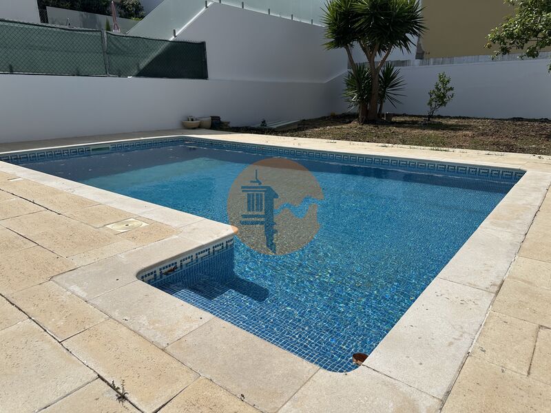 Moradia nova V4 Olhão - lareira, piscina, terraço, ar condicionado, bbq, painel solar, varandas, quintal