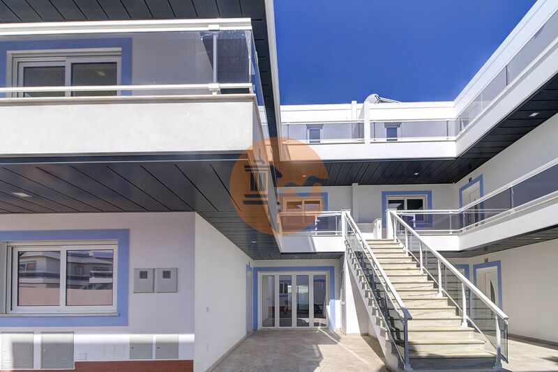Apartamento T1 Moderno Vila Nova de Cacela Vila Real de Santo António - ar condicionado, parqueamento, zonas verdes, cozinha equipada, garagem, painéis solares, condomínio privado, piscina