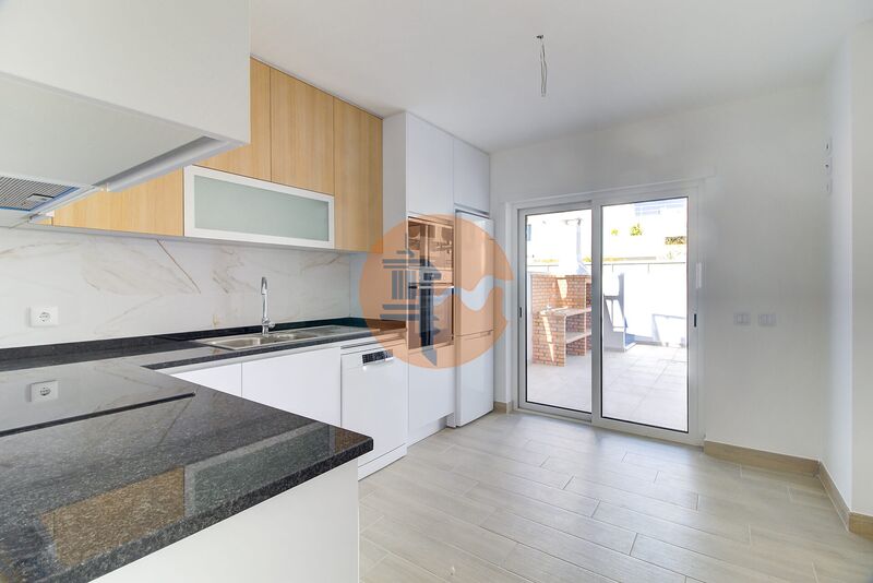 Apartment neue T1 Vila Nova de Cacela Vila Real de Santo António - solar panels, green areas, parking lot, air conditioning, swimming pool, condominium, garage, kitchen