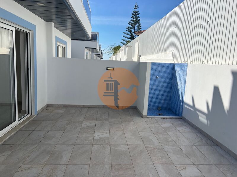Apartamento T1 Moderno Vila Nova de Cacela Vila Real de Santo António - condomínio privado, cozinha equipada, painéis solares, parqueamento, zonas verdes, ar condicionado, piscina, garagem