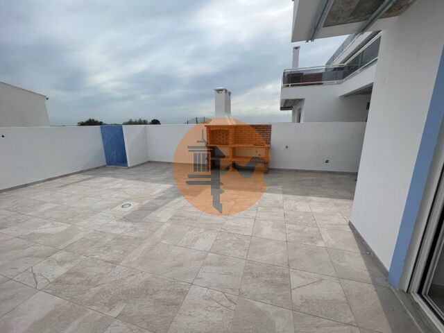 Apartamento T1 Moderno Vila Nova de Cacela Vila Real de Santo António - ar condicionado, garagem, painéis solares, condomínio privado, zonas verdes, cozinha equipada, parqueamento, piscina