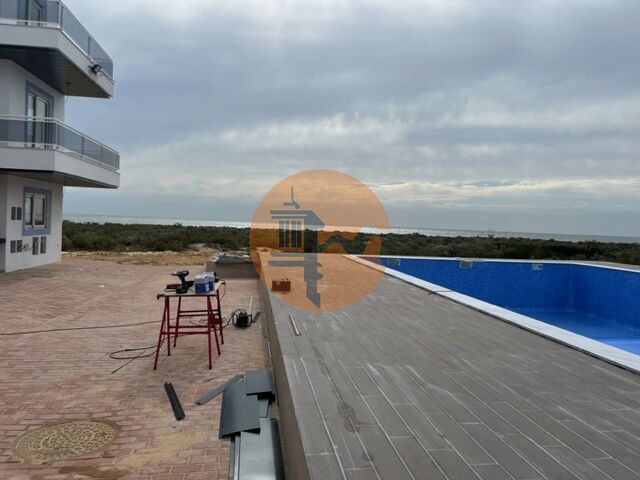 Apartamento novo T1 Vila Nova de Cacela Vila Real de Santo António - piscina, ar condicionado, parqueamento, cozinha equipada, painéis solares, garagem, condomínio privado, zonas verdes