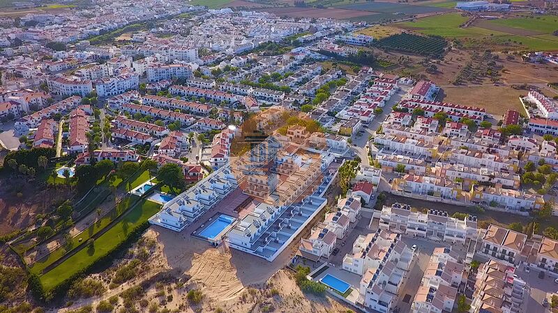 Apartamento T1 Duplex Vila Nova de Cacela Vila Real de Santo António - piscina, bbq, ar condicionado, zonas verdes, condomínio privado, terraço, painéis solares, garagem