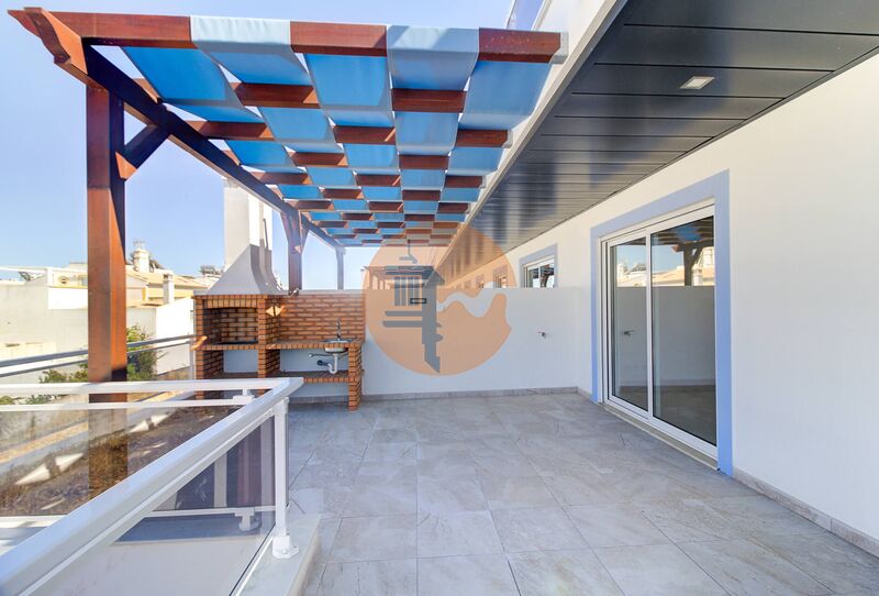 Apartment neue T1 Vila Nova de Cacela Vila Real de Santo António - air conditioning, garage, barbecue, terrace, green areas, condominium, swimming pool, solar panels