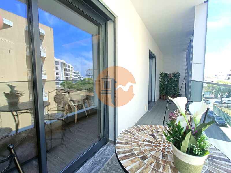 Apartamento T2 Moderno bem localizado Baixa Olhão - vidros duplos, varanda, ar condicionado, painel solar, piscina