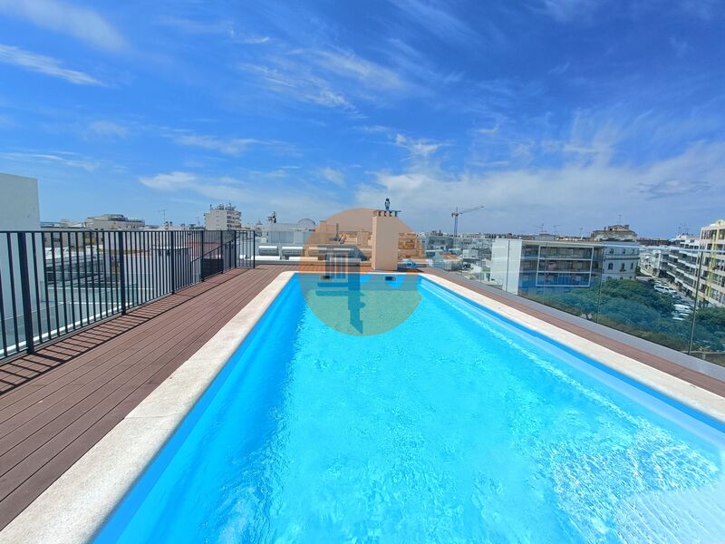 Apartment 2 bedrooms Modern well located Baixa Olhão - double glazing, balcony, air conditioning, solar panel, swimming pool