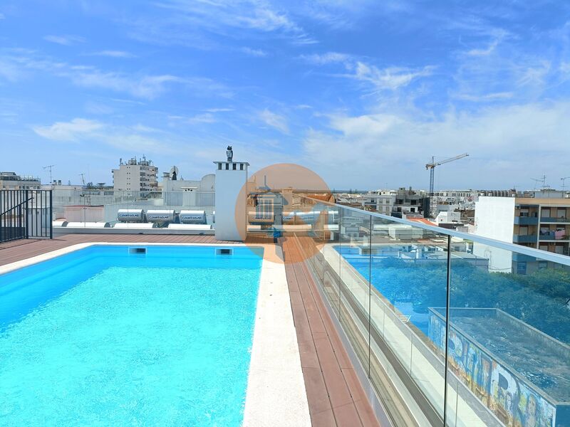 Apartamento T2 Moderno bem localizado Baixa Olhão - vidros duplos, varanda, ar condicionado, painel solar, piscina
