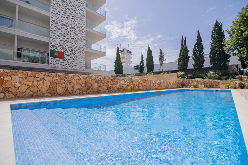 Apartment 1 bedrooms new Portimão - swimming pool, kitchen, gated community, store room, balcony, air conditioning, double glazing