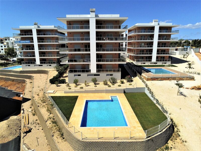 Apartment T1+1 Modern Praia da Rocha Portimão - solar panel, garden, air conditioning, double glazing, swimming pool, balcony, underfloor heating, sea view