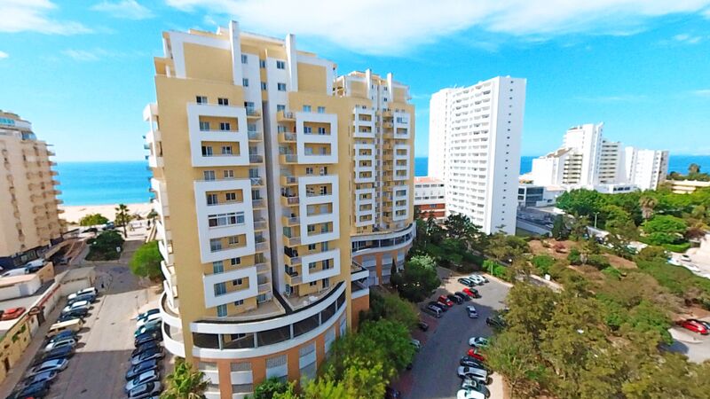 Apartamento T2 Praia da Rocha Portimão à venda - chão radiante, vista mar, ar condicionado, varanda, garagem, piscina