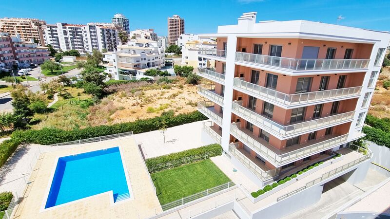 Apartamento novo T0+1 Praia da Rocha Portimão - varandas, jardim, vista mar, chão radiante, piscina, ar condicionado