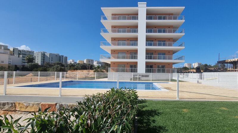 апартаменты новые T1+1 Praia da Rocha Portimão - вид на море, бассейн, веранда, пол с подогревом, система кондиционирования, веранды, сад