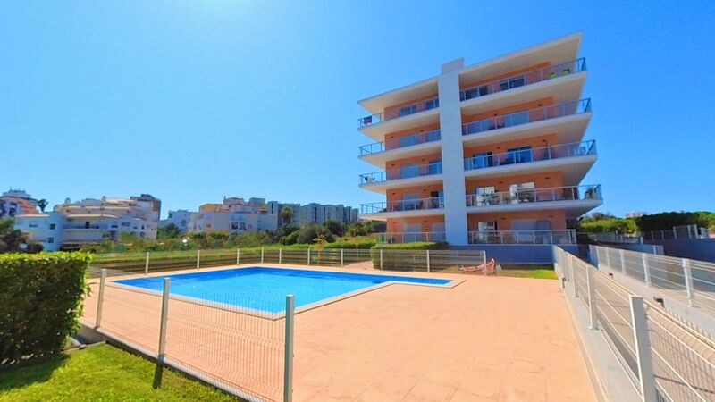 Apartment T1 sea view Portimão - gated community, balcony, air conditioning, underfloor heating, barbecue, kitchen, swimming pool, sea view, garden