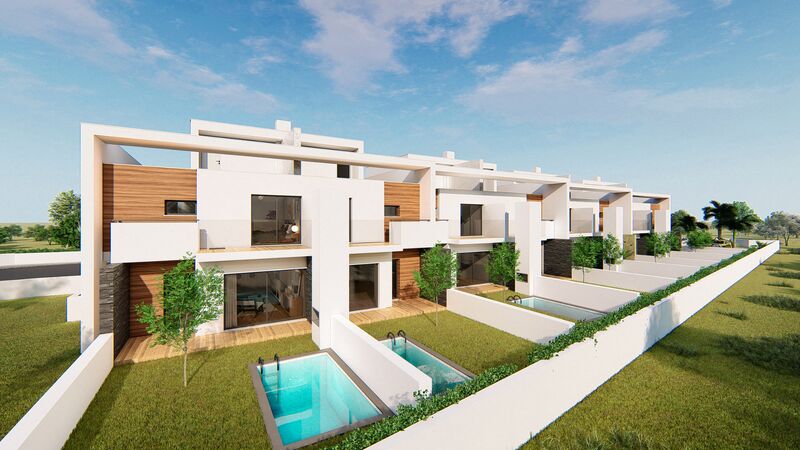 House 2 bedrooms townhouse Ferreiras Albufeira - private condominium, alarm, attic, balconies, air conditioning, double glazing, solar panels, garage, swimming pool, garden, barbecue, balcony