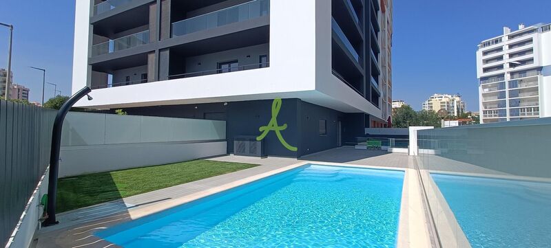 Apartamento T2 Moderno Portimão - cozinha equipada, equipado, condomínio fechado, ar condicionado, piscina, varandas