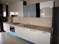 Alugar Apartamento T1 Semi novo Nossa Senhora do Pópulo Caldas da Rainha - painéis solares, cozinha equipada, varanda, ar condicionado